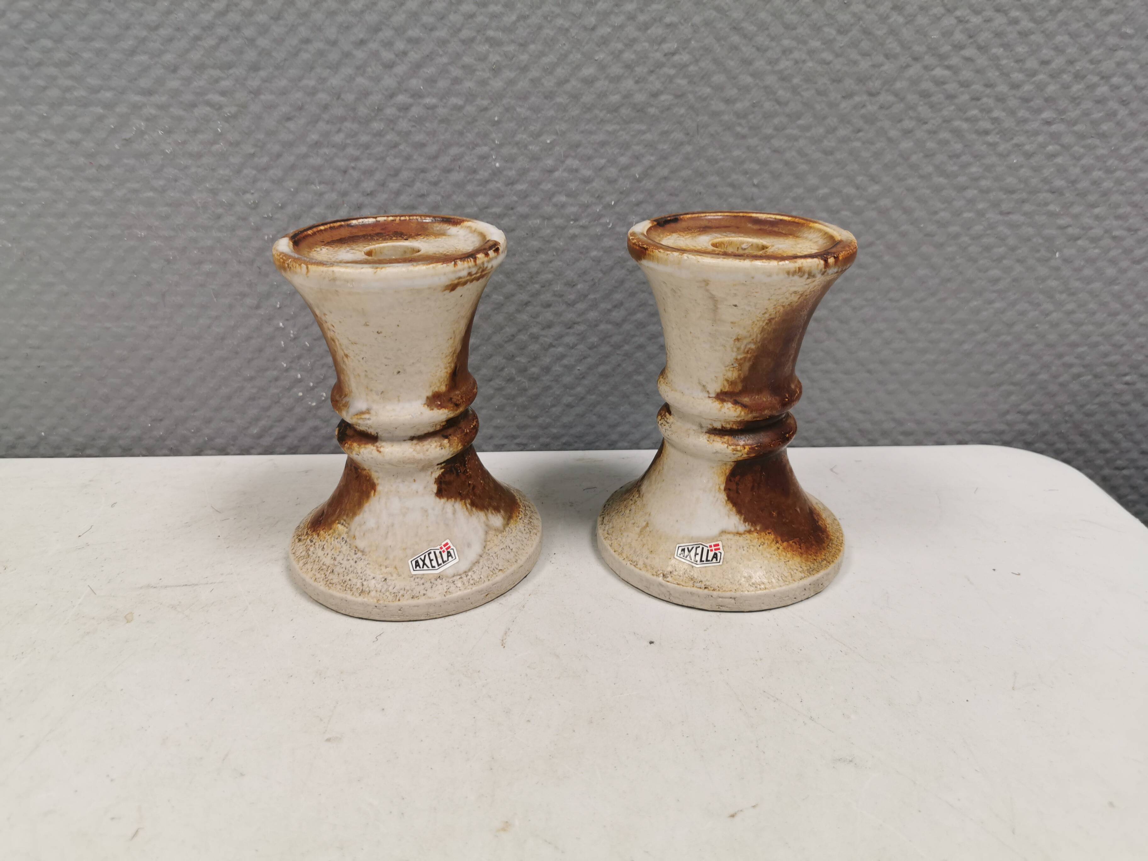 A set of ceramic candleholders by Axel Larsen for his own company, Axella