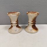 A set of ceramic candleholders by Axel Larsen for his own company, Axella