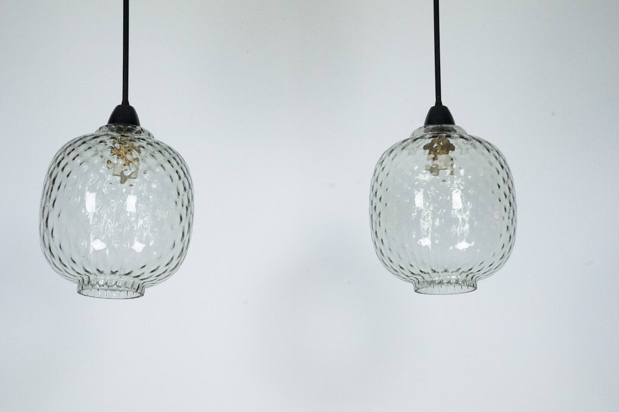 Pair of Mid-Century pendant lamps in smoked Murano glass, Italy, 1950s