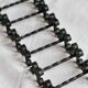 6 vintage black metal knife rests with scroll decorations