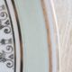 French porcelain dessert plates, green and gold.