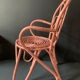 Vintage pink rattan armchair