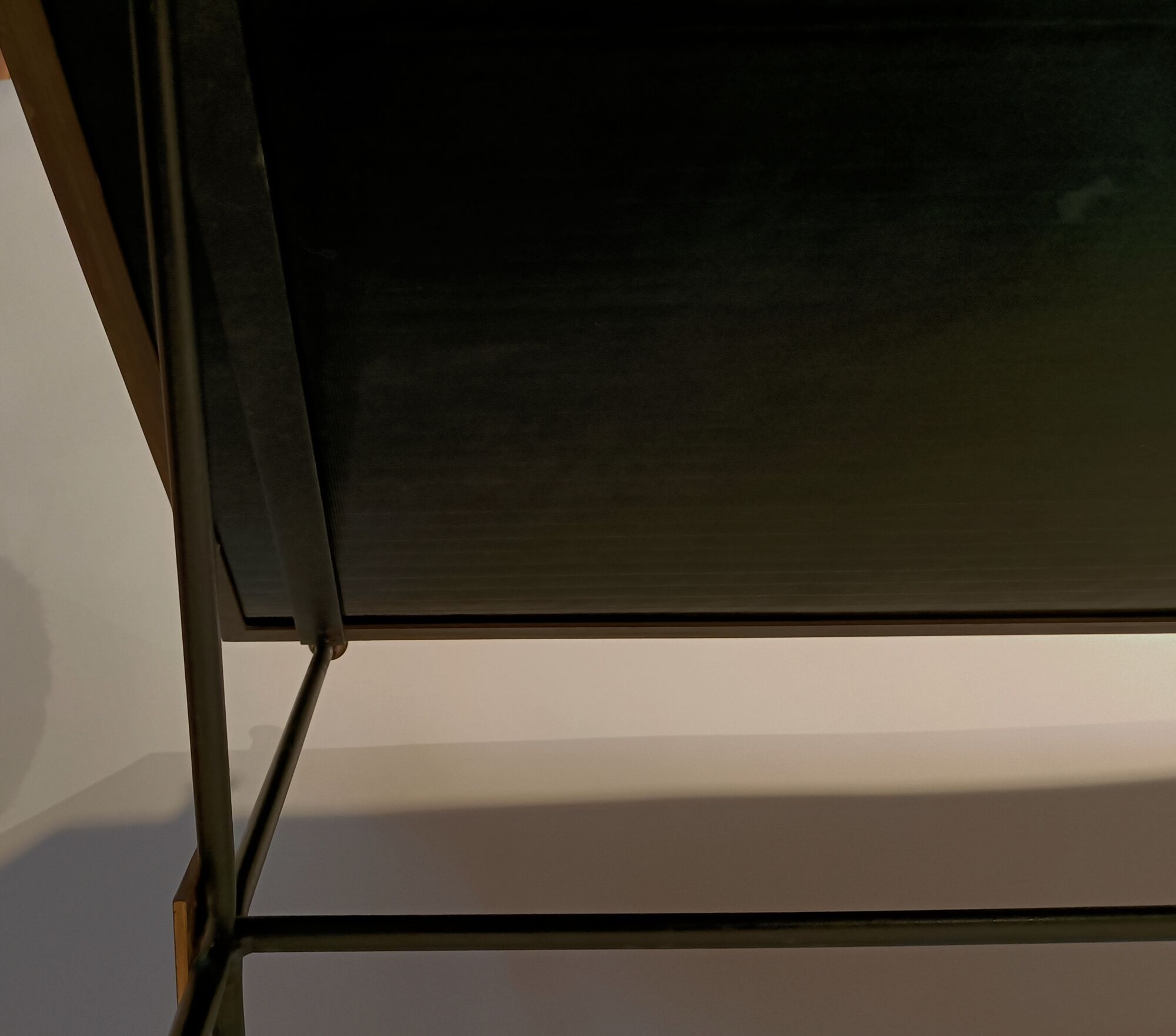 Coffee table in gilded brass, black metal and black opaline top, circa 1950