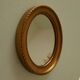 Small vintage oval mirror in gilded resin from the 60s/70s.