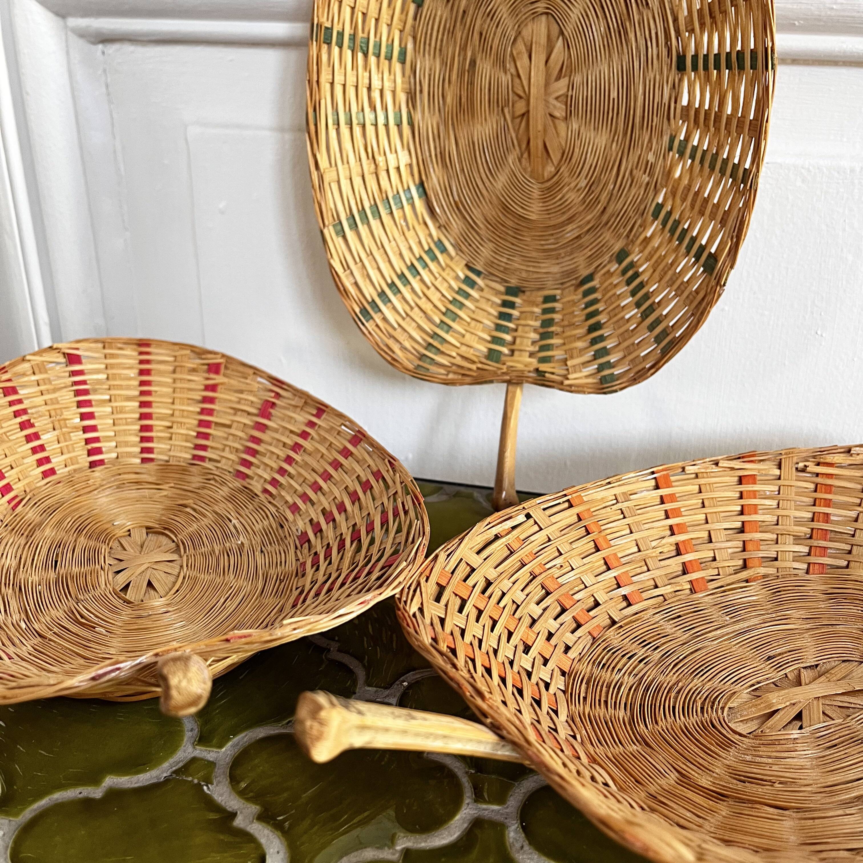Trio of vintage wicker and bamboo baskets
