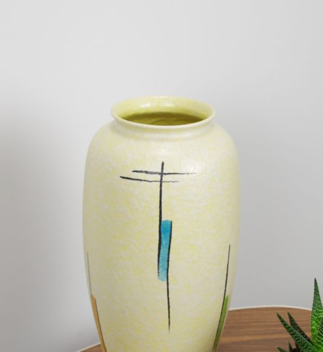 Vintage vase in light yellow porcelain