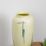 Vintage vase in light yellow porcelain