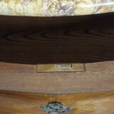 Curved Louis XV style commode with floral marquetry and marble top.