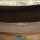 Curved Louis XV style commode with floral marquetry and marble top.
