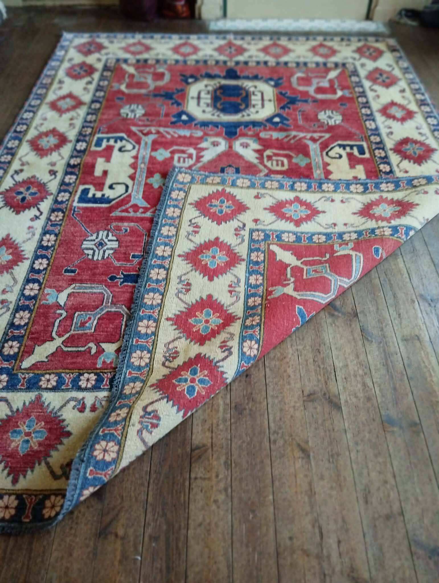 Handmade Pakistani Kazak rug 303x225cm