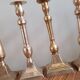 Set of 10 bronze-tinted brass candle holders 01 Pro