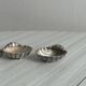 2 light metal shell cups