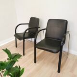 Set of 2 vintage office chairs in black leather chrome base plastic armrests / retro 1980s room