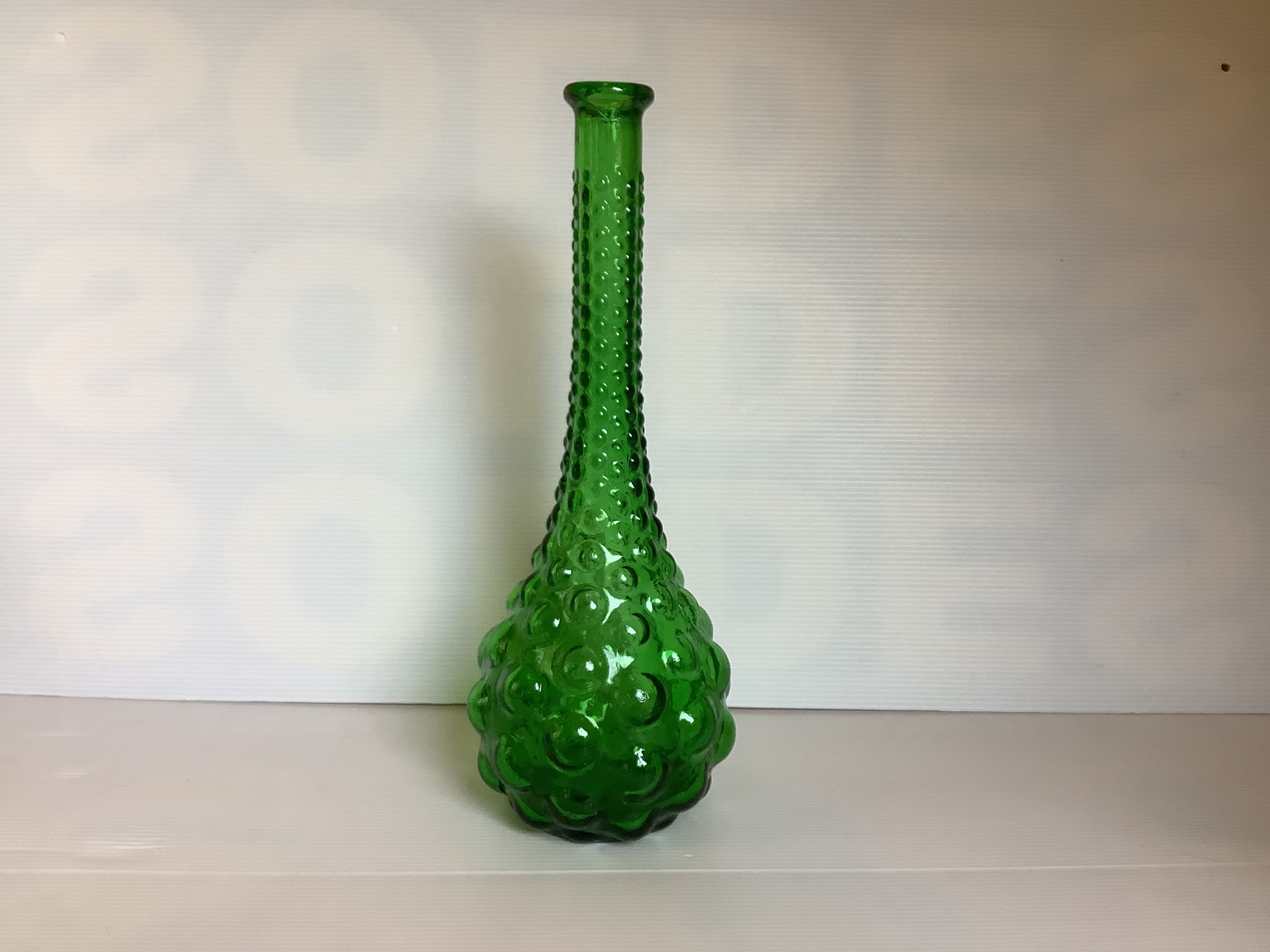 Bouteille en verre verte bulles Italie
