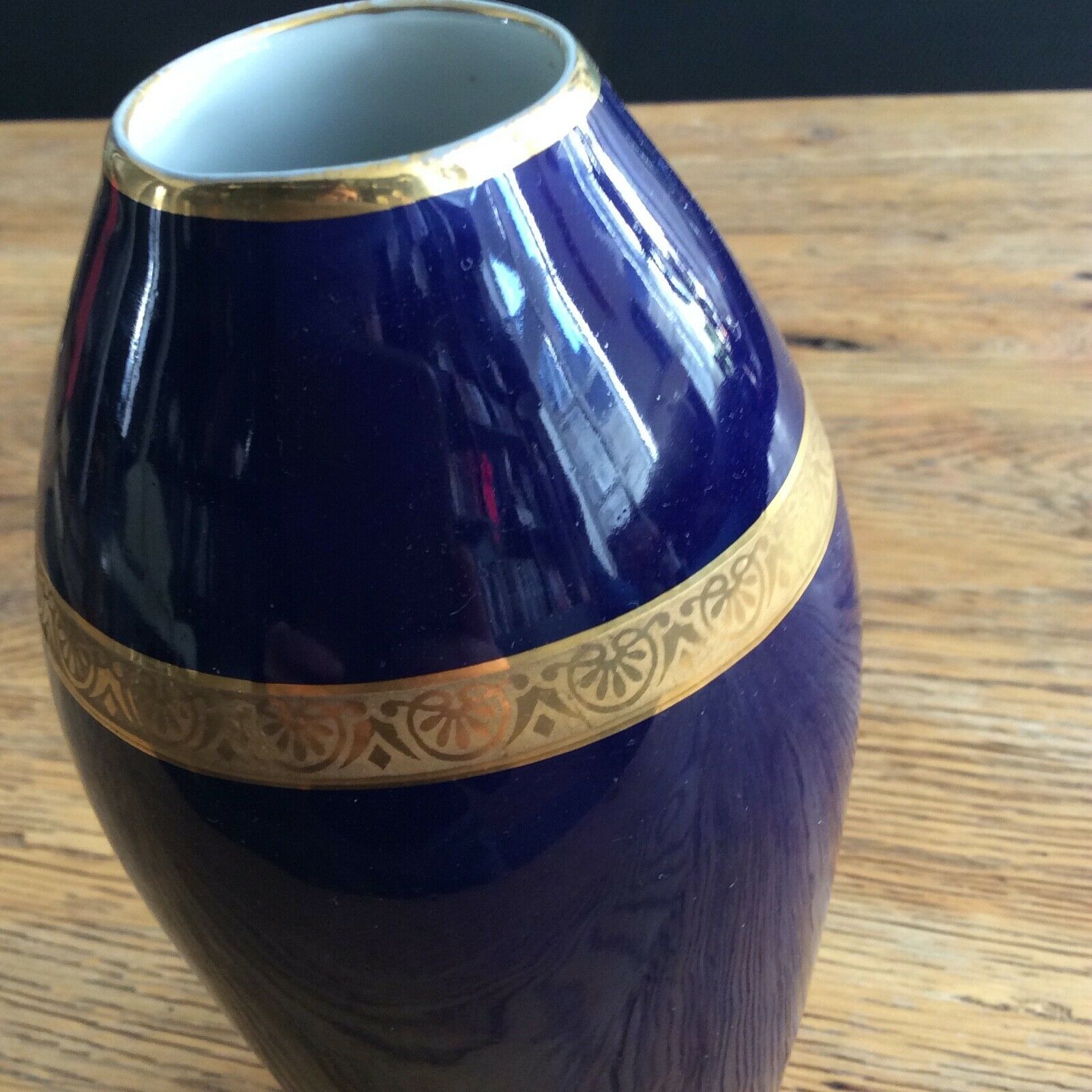 Vase in blue porcelain of four golden frieze, FM Limoges