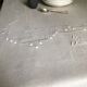 Antique linen tablecloth and whipped cream silk