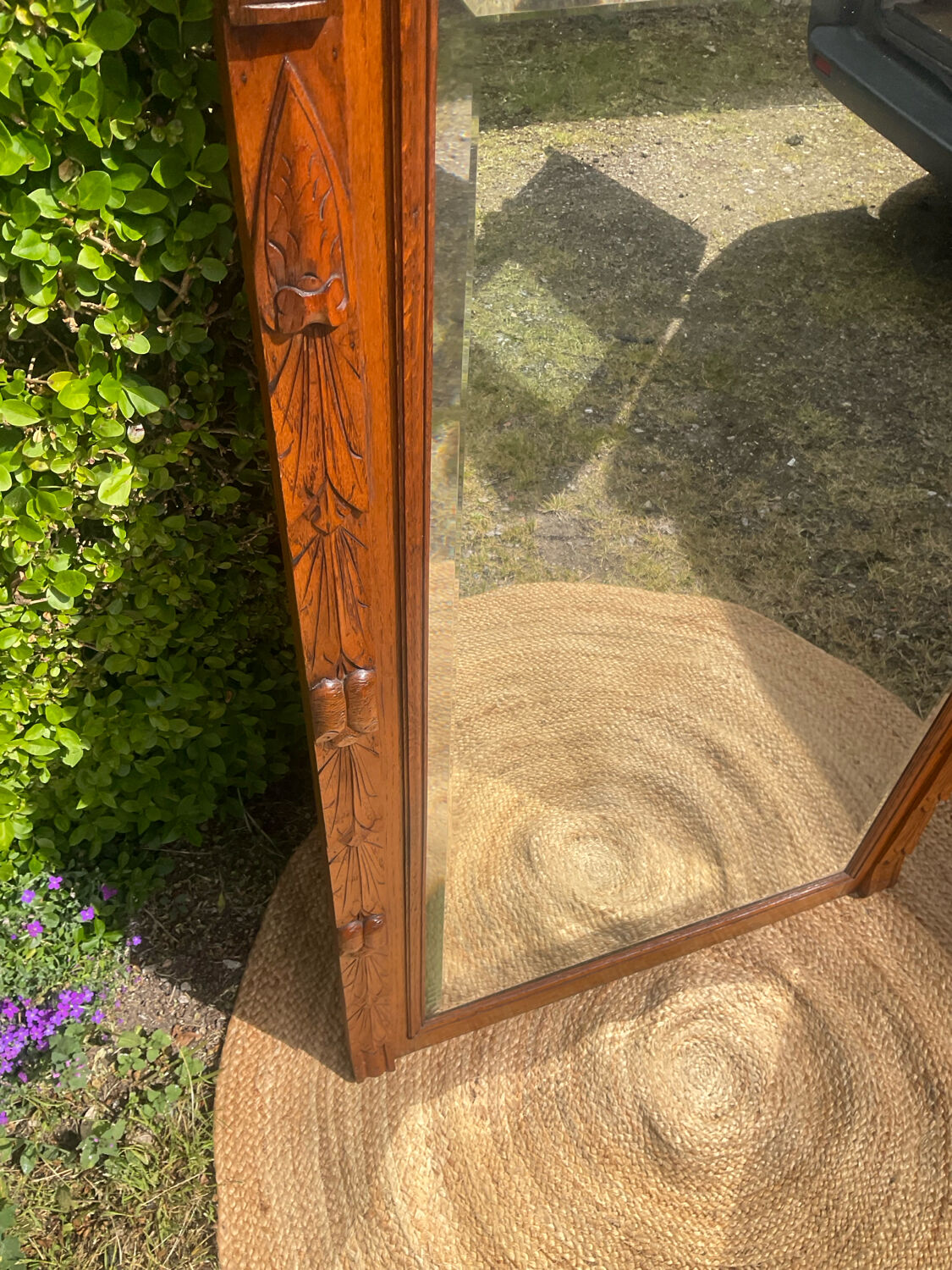 Antique large trumeau mirror in solid wood and bevelled glass.