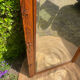 Antique large trumeau mirror in solid wood and bevelled glass.