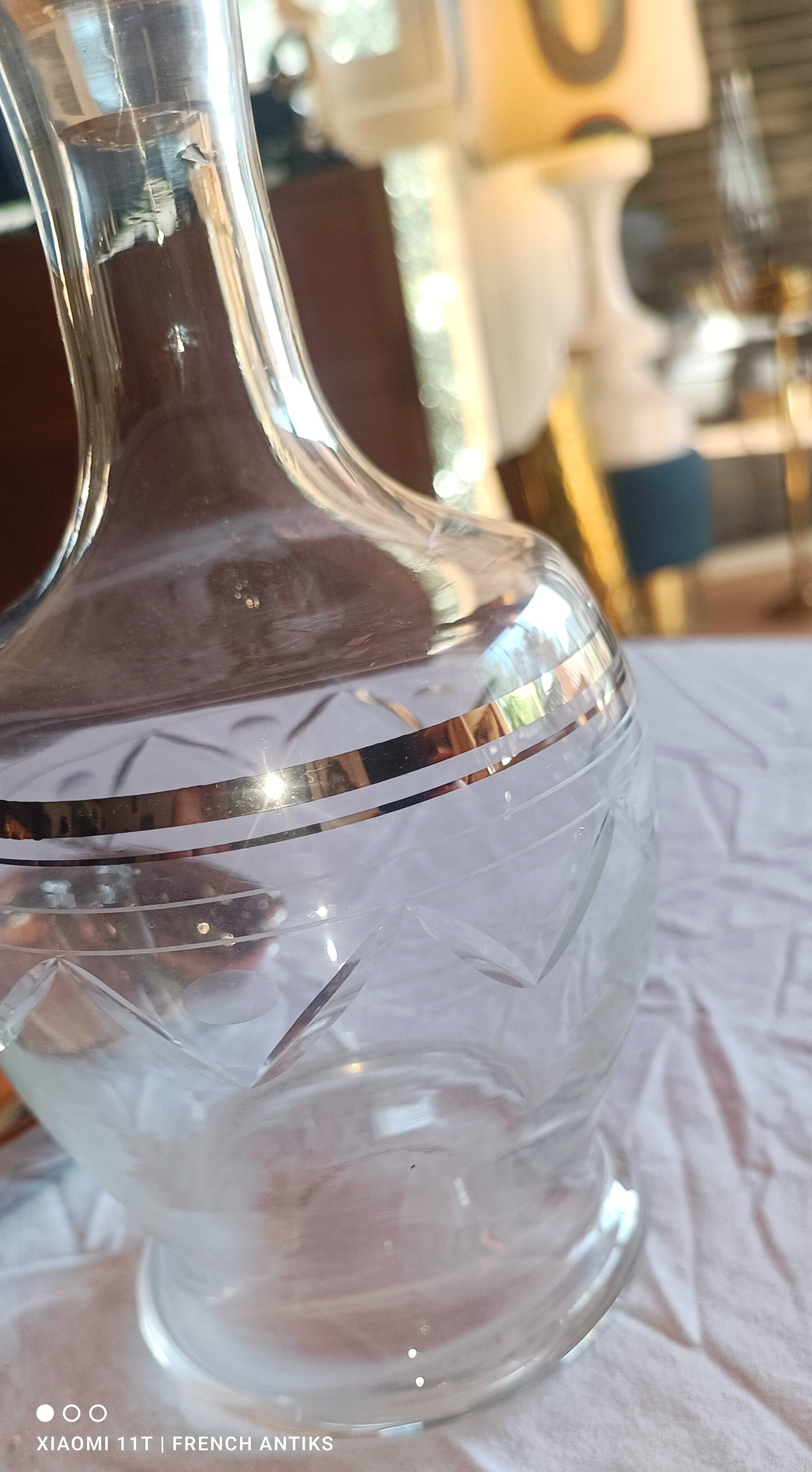 Blown glass decanter, engraved and chiselled. Made in France.