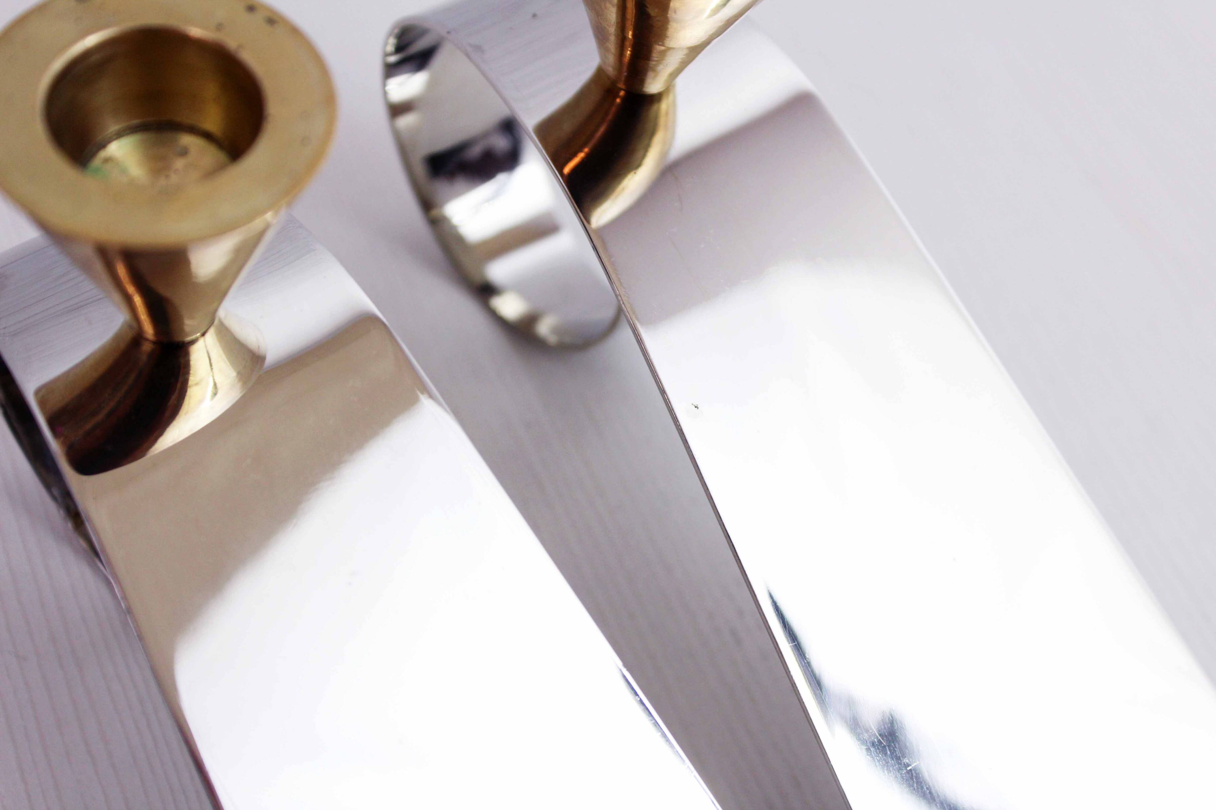 Pair of brass and chrome-plated metal candlesticks