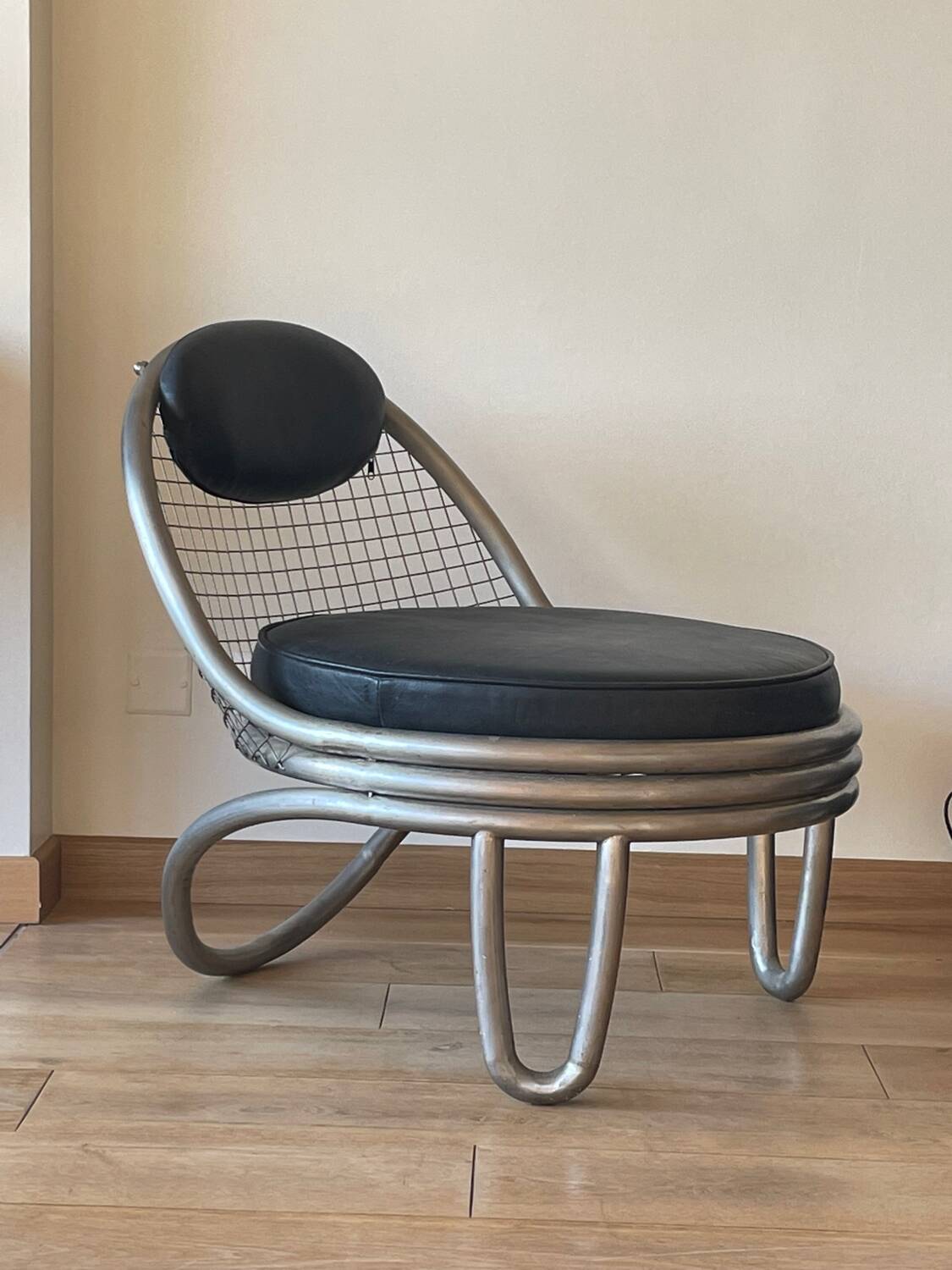 Metal and leather armchairs