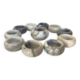 Eleven marble candlesticks