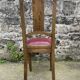 Pair of studded burgundy leather Art Deco chairs
