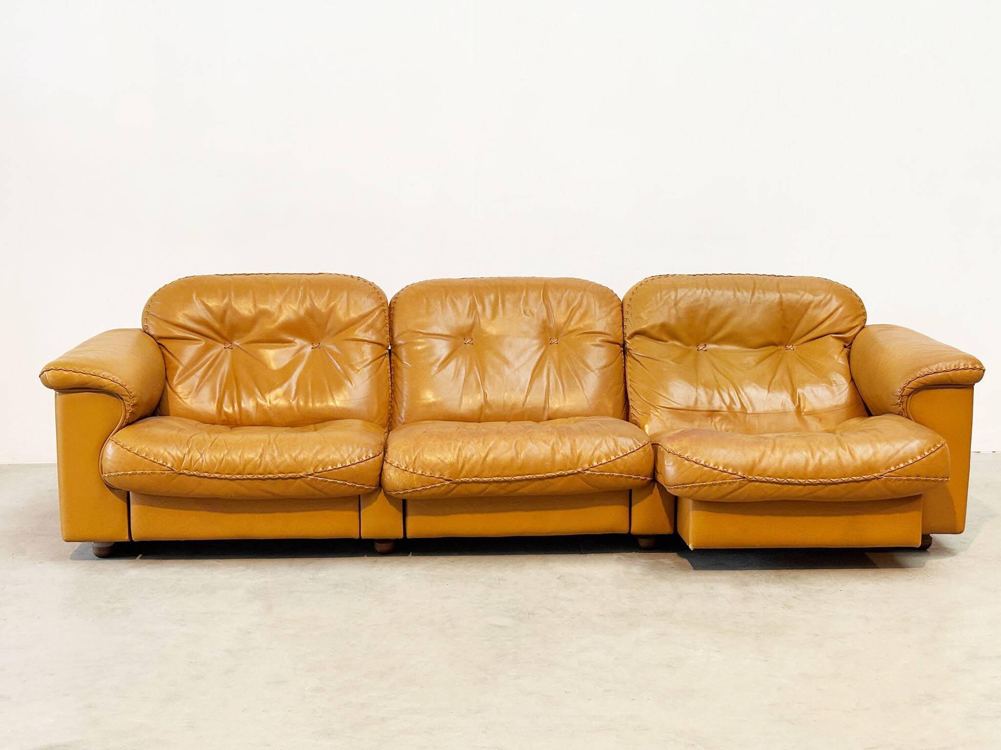 De Sede DS101 three-seater in cognac leather.