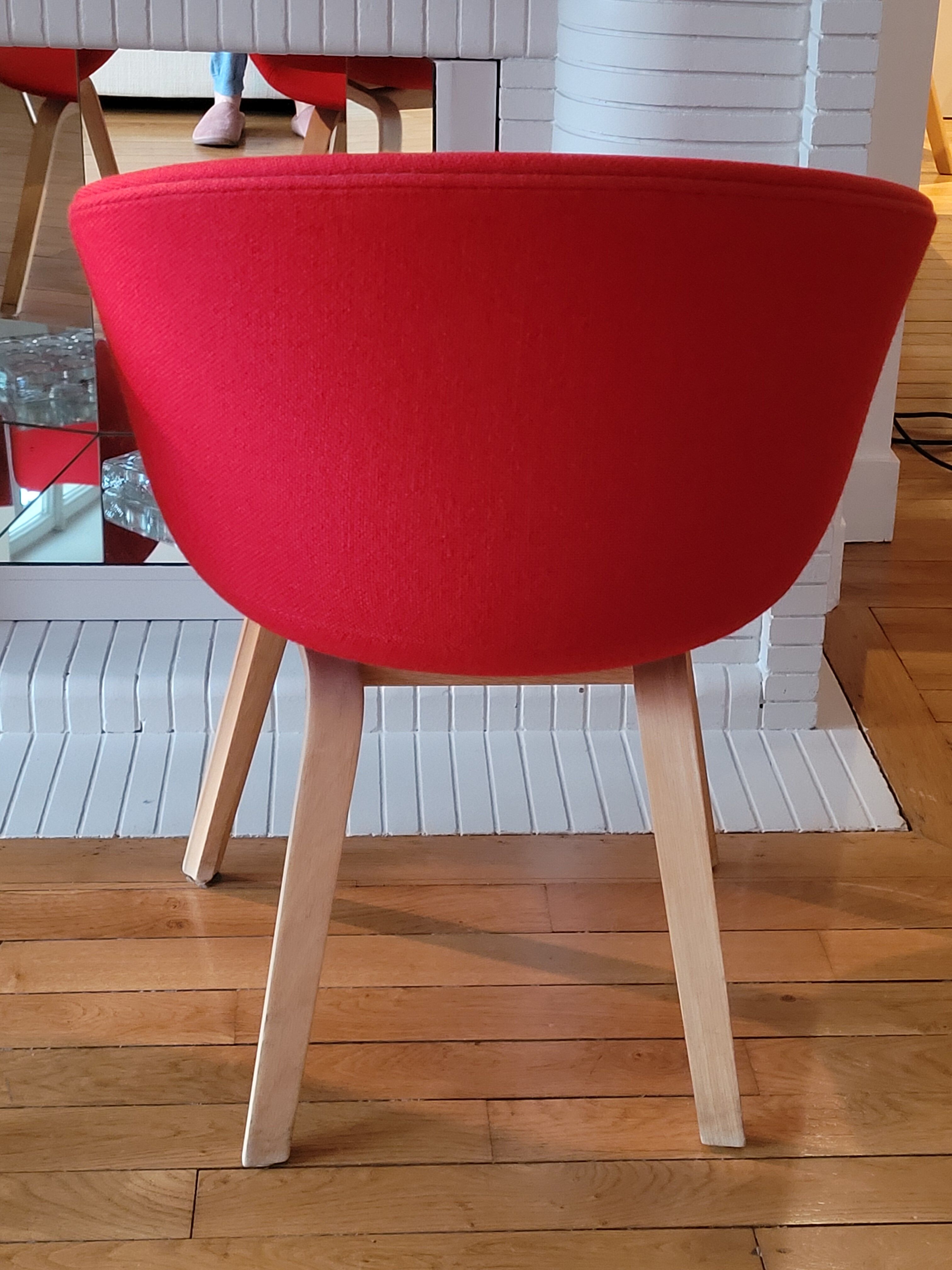 red canvas and wood armchair