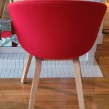 red canvas and wood armchair