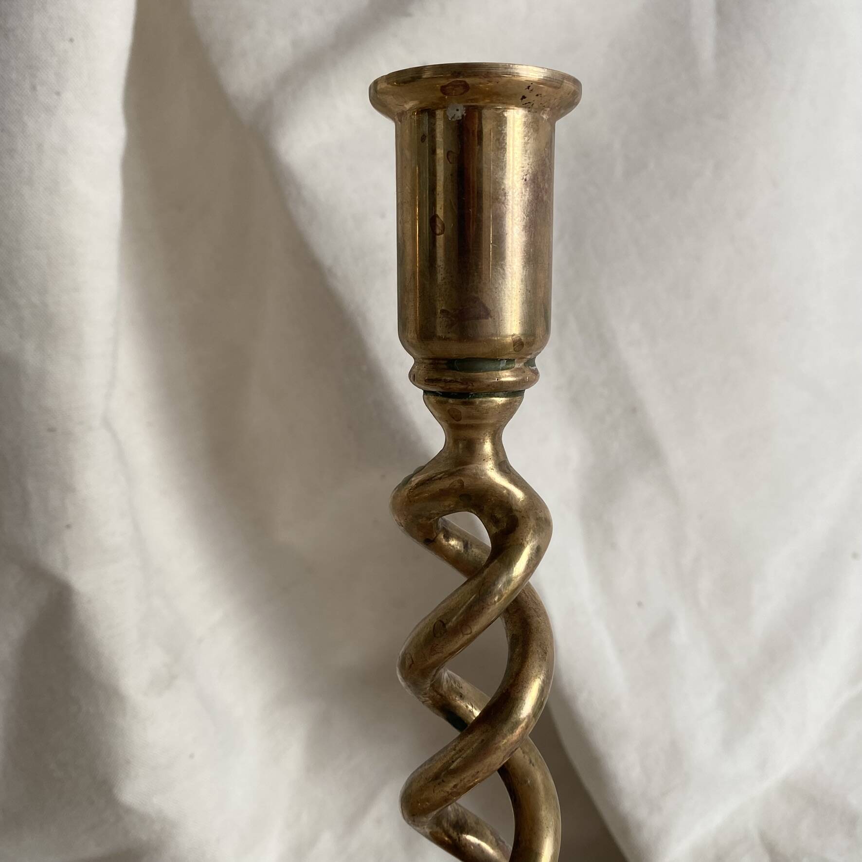 Pair of twisted brass candlesticks