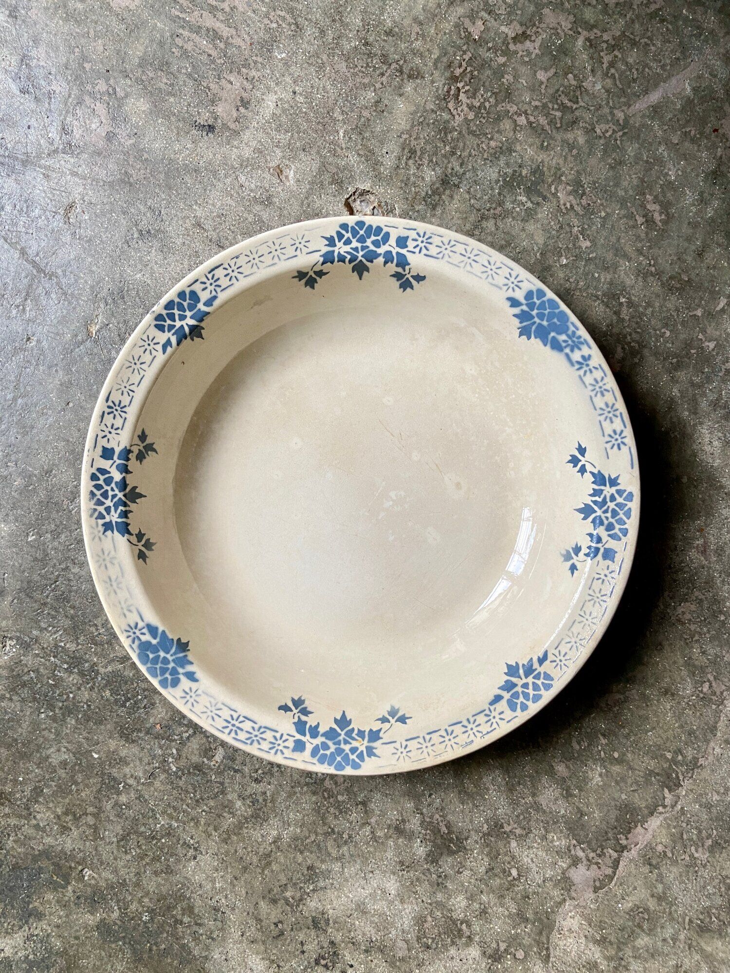 Badonviller round and hollow dish in white and blue glazed earthenware, "Verdun" service