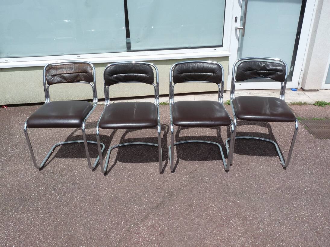 Set of 4 chrome metal and vintage leather chairs