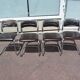 Set of 4 chrome metal and vintage leather chairs