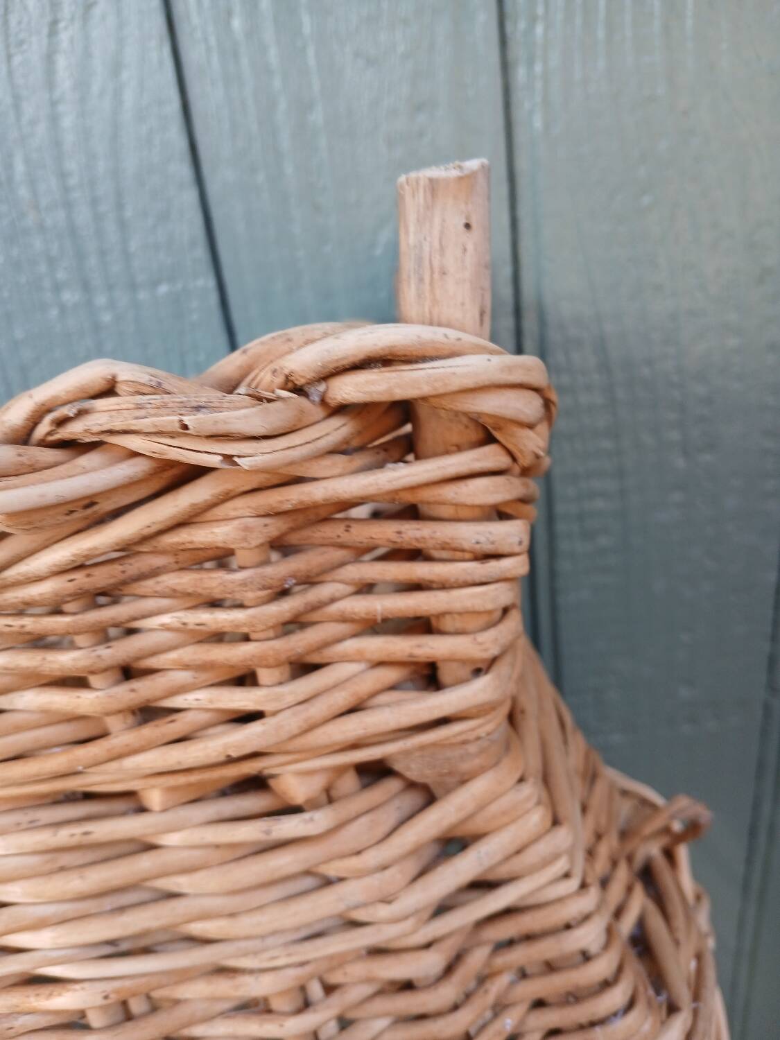 Antique wicker magazine rack