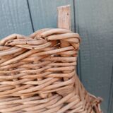 Antique wicker magazine rack
