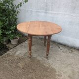 Round table with folding sides