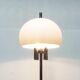 Italian space-style floor lamp from the 1960s with a stone base.