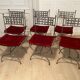 6 chaises curule en fer forgé avec assise en velours rouge