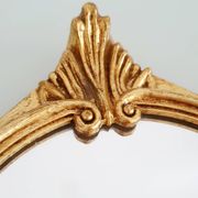 Miroir en bois doré à la feuille d'or