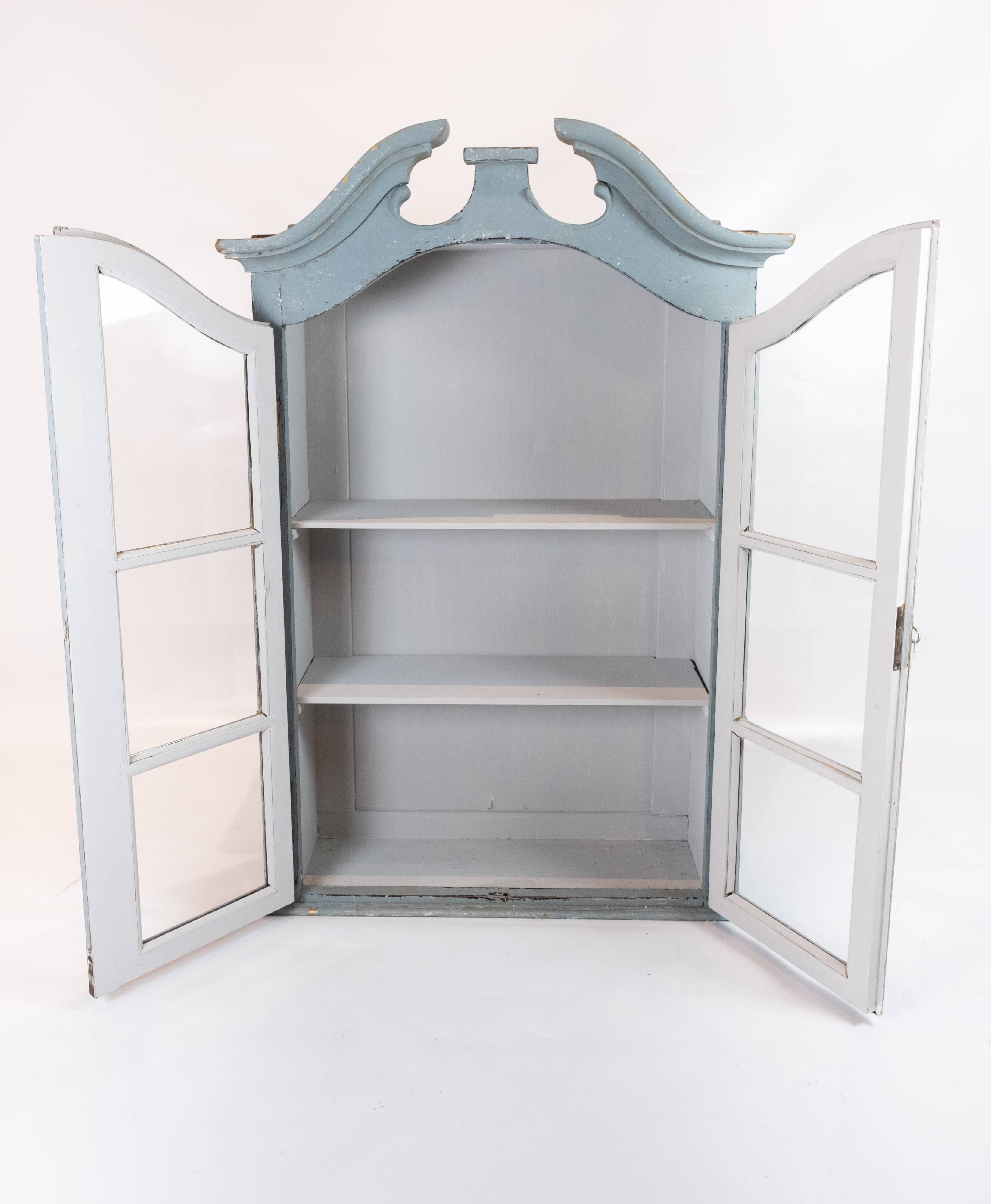 Grey painted hanging glass cabinet in gustavian style from around 1820.