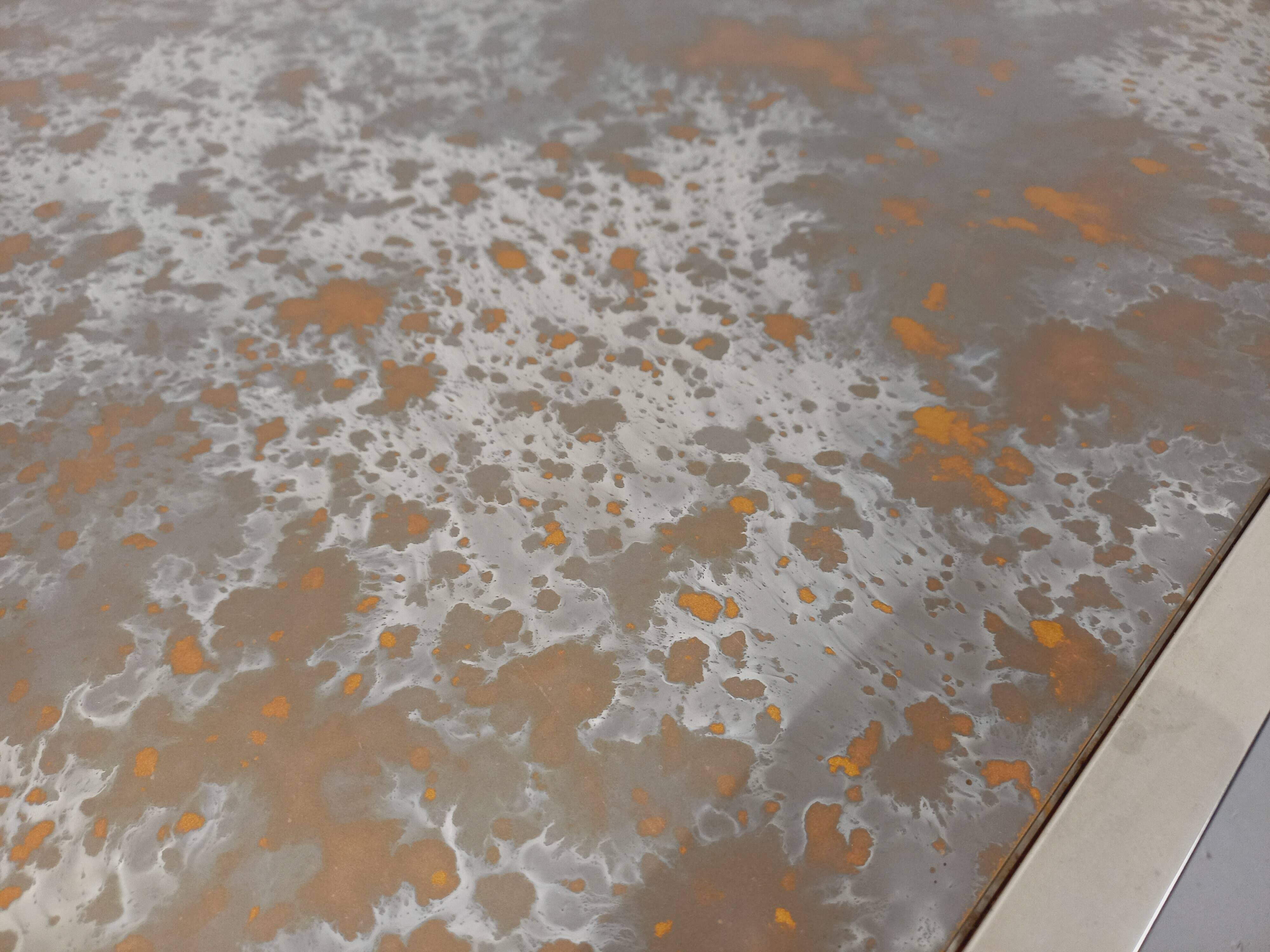 Vintage coffee table in églomisé glass, chrome and leather from the 70s