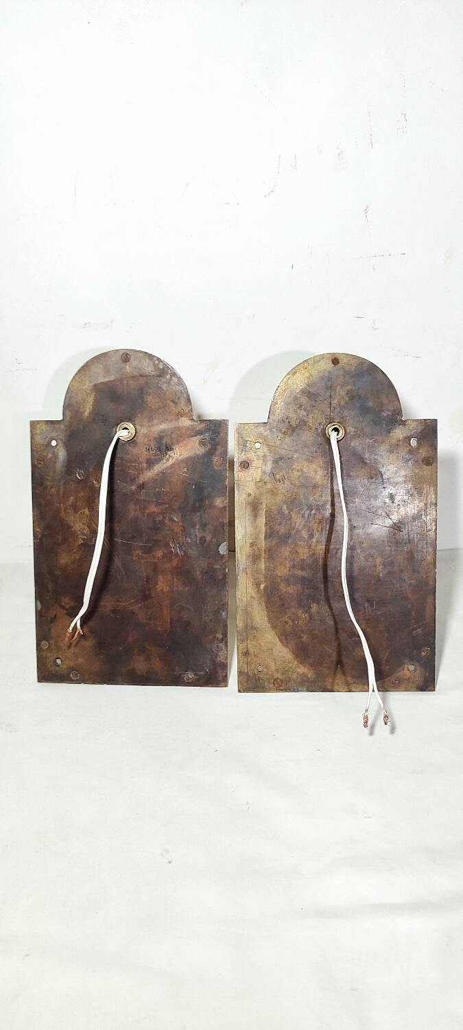 Par de apliques de bronce. España, 1950s.