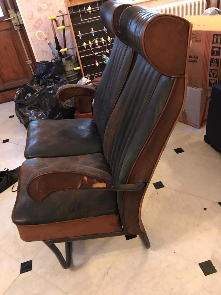 Vintage 1950s leather double-plane bus armchairs