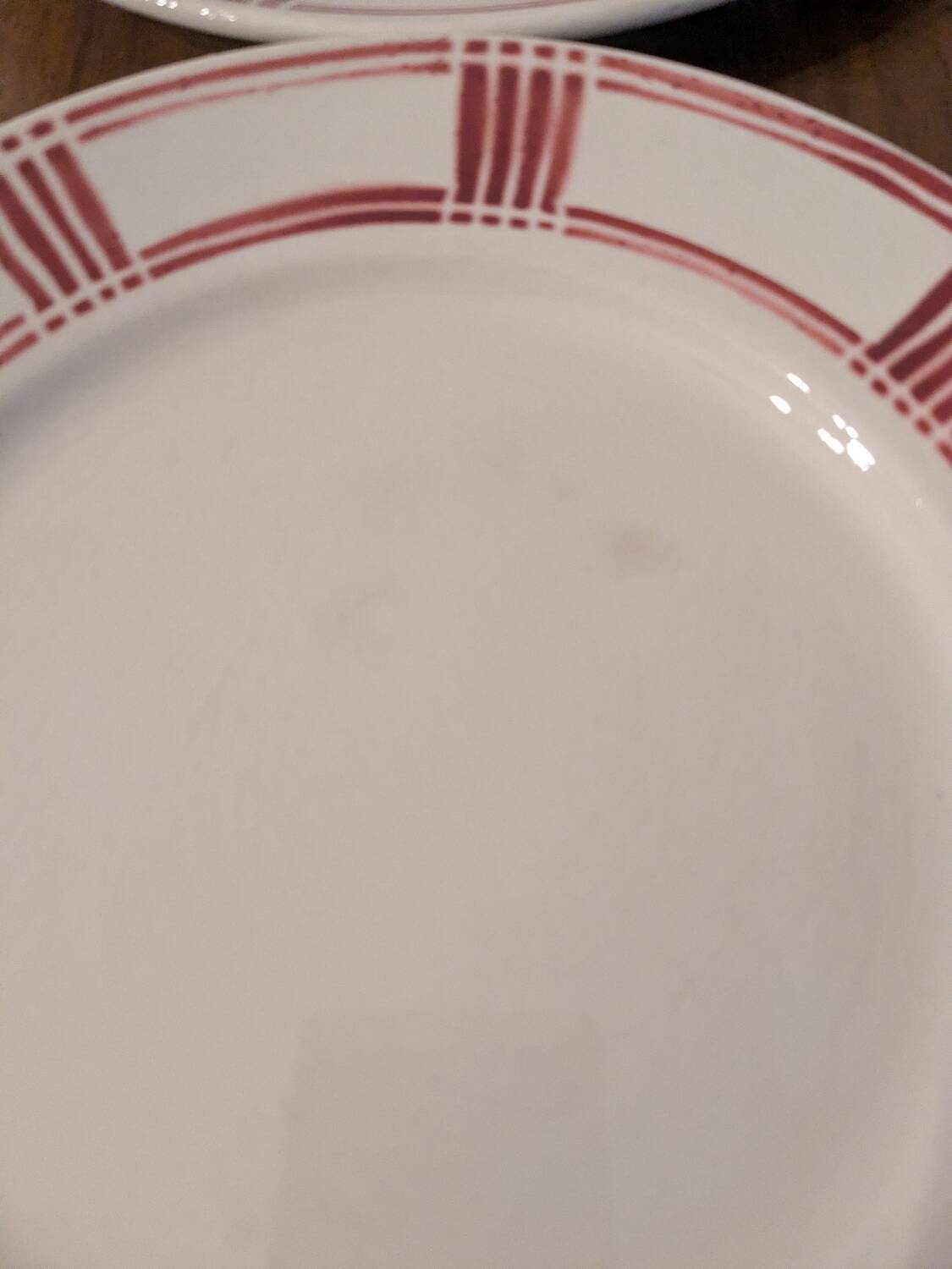 Huit assiettes plates Badonviller