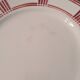 Eight Badonviller dinner plates