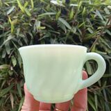 Set of green opaline cups