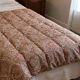 Vintage duvet/bedspread with a paisley pattern.