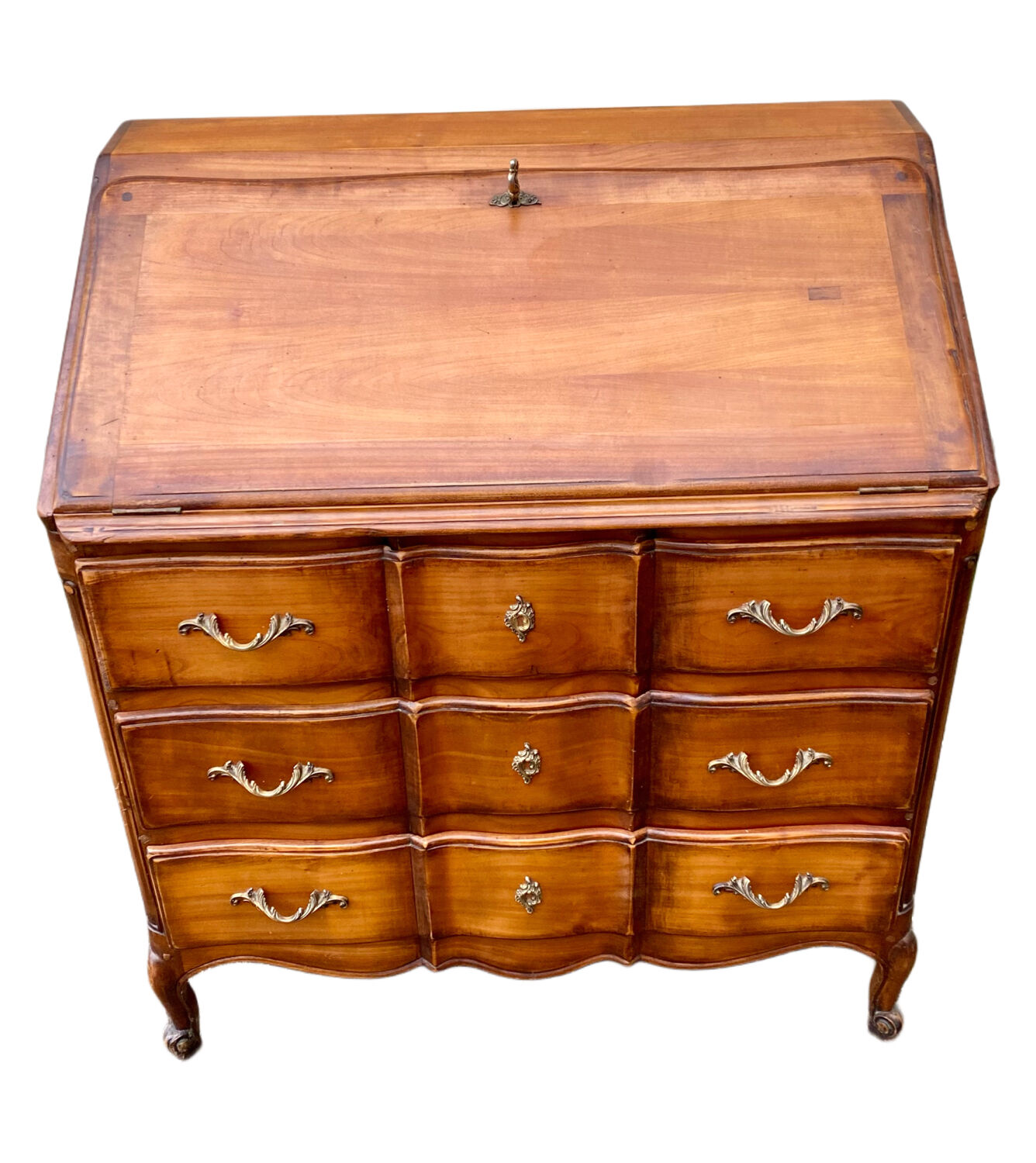 Secretary desk called "scriban" in Louis XV style made of fruitwood.