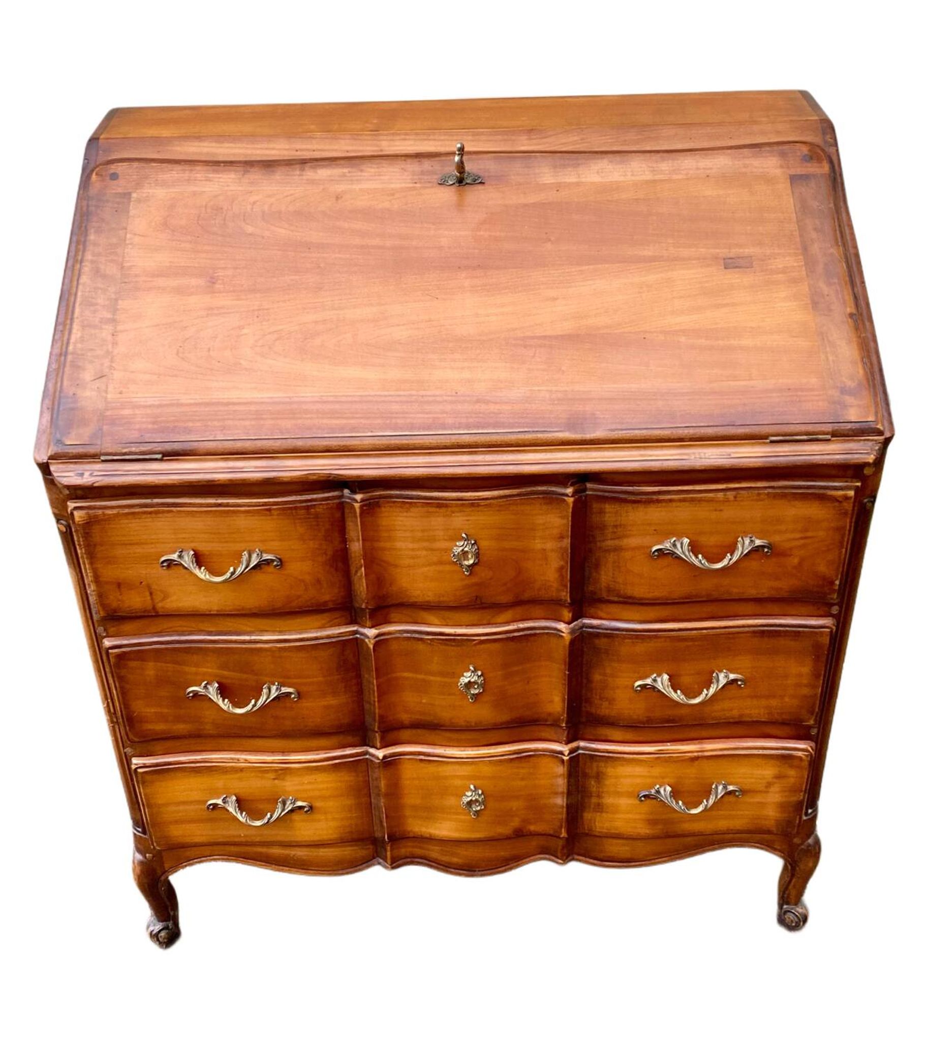 Secretary desk called "scriban" in Louis XV style made of fruitwood.